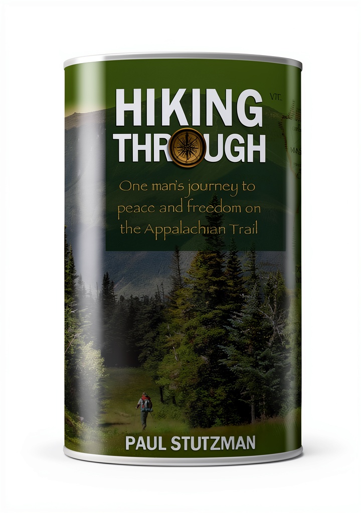 Hiker reading Revell Hiking Guide on a Kindle device in a forest
